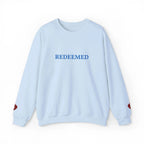 Woman wearing REDEEMED faith crewneck, Christian gift for her