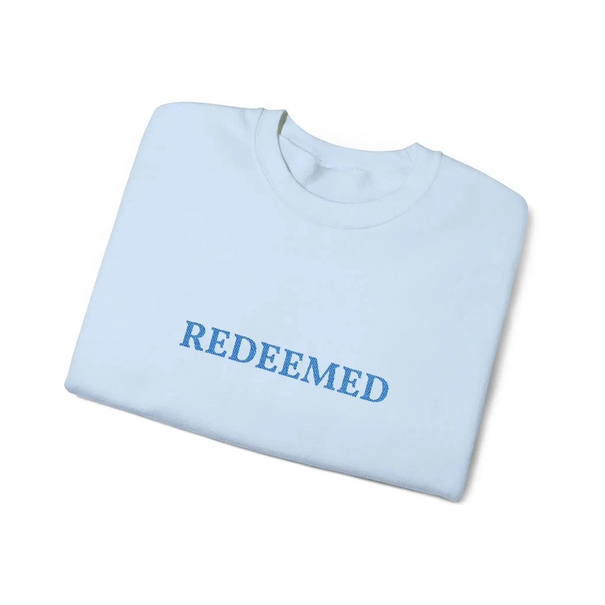 REDEEMED crewneck worn outdoor, Christian women's faith apparel
